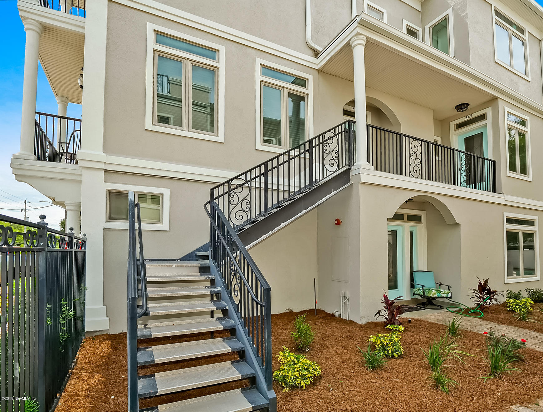 345 Ahern Street Atlantic Beach, FL 32233 - Photo 4 of 44 front view of a house with a stairs