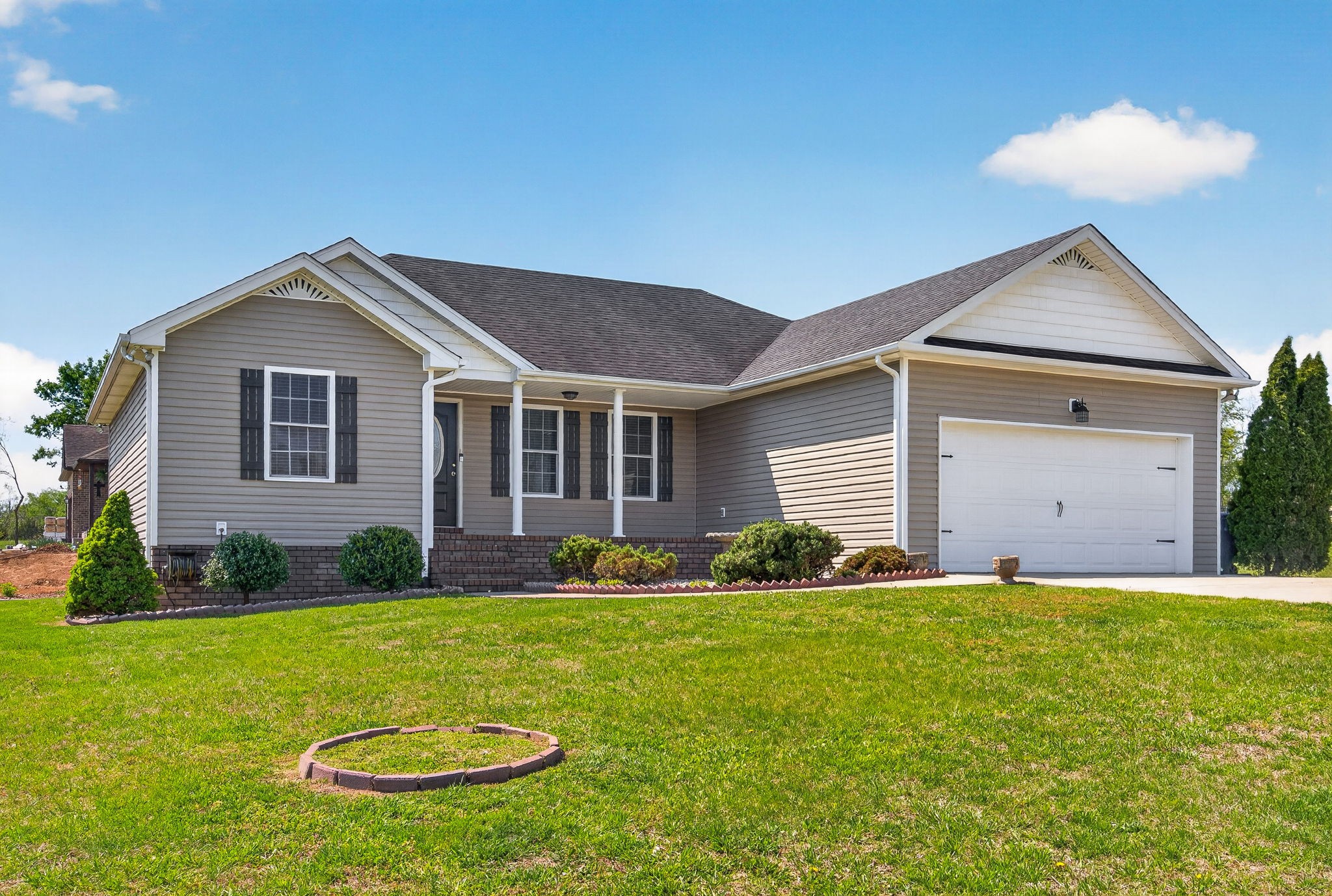 126 Hollands Way Portland, TN 37148 - Photo 2 of 42 a front view of house with yard and green space