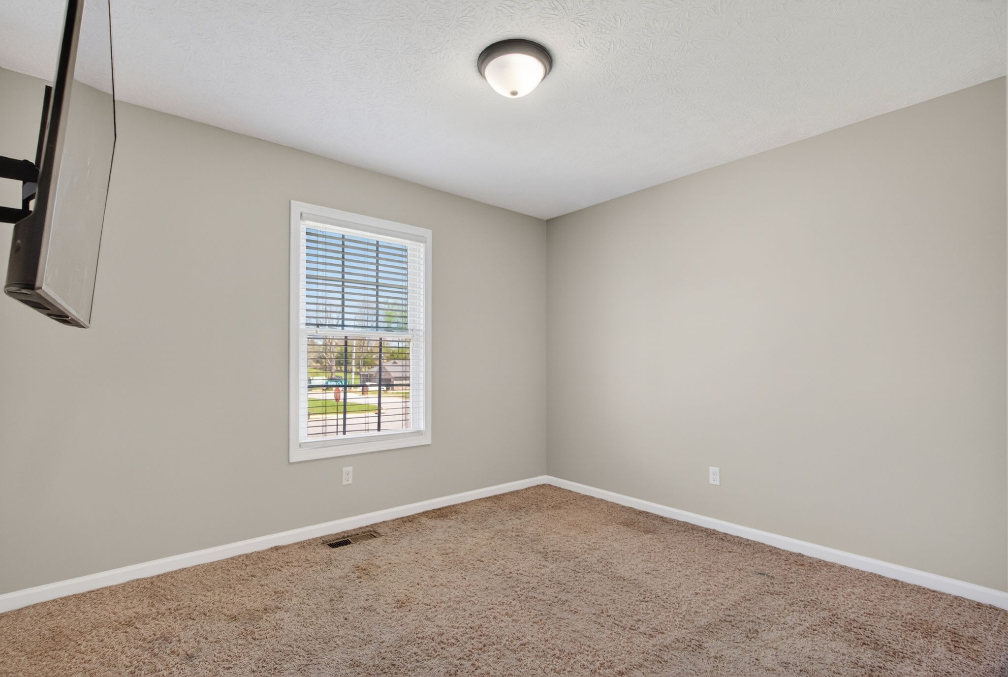 126 Hollands Way Portland, TN 37148 - Photo 28 of 42 an empty room with a window