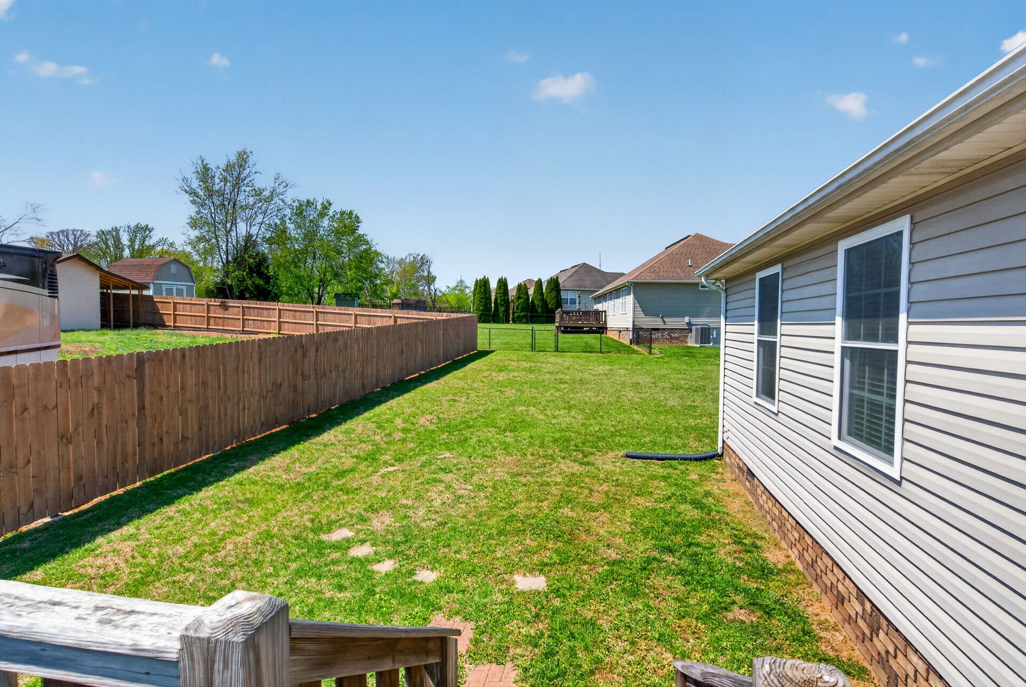 126 Hollands Way Portland, TN 37148 - Photo 38 of 42 a view of a backyard with a garden
