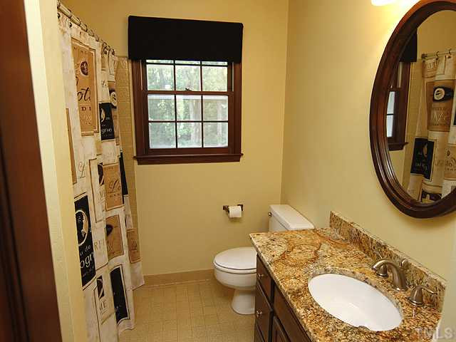 8904 Jeanew Court Raleigh, NC 27613 - Photo 15 of 25 Has update granite countertop, faucets, lighting and fixtures. Plenty of room to primp! Linen closet nearby in the hall. Bathroom