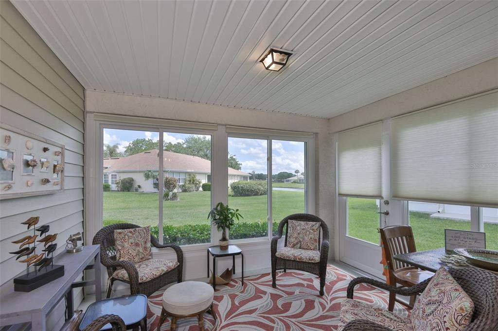 2012 Nantucket Drive, Unit 22 Sun City Center, FL 33573 - Photo 12 of 90 a living room with furniture and a large window