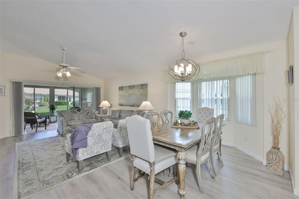 2012 Nantucket Drive, Unit 22 Sun City Center, FL 33573 - Photo 27 of 90 a view of a dining room with furniture window and outside view