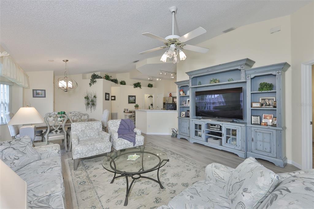 2012 Nantucket Drive, Unit 22 Sun City Center, FL 33573 - Photo 7 of 90 a living room with furniture and a flat screen tv