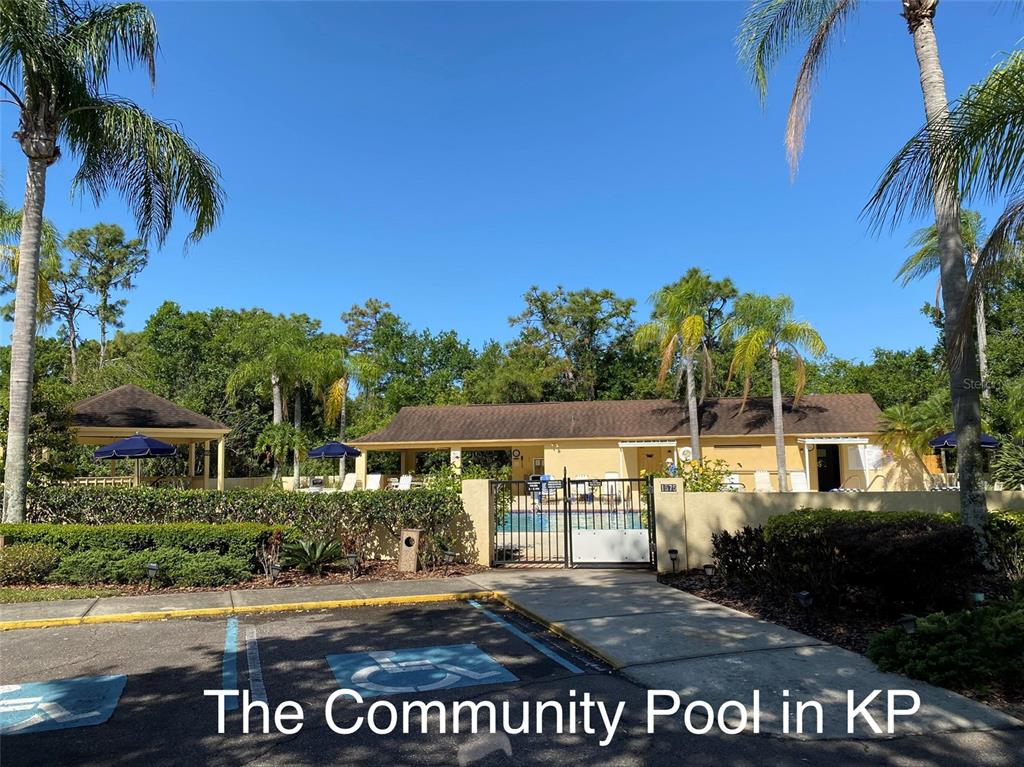 2012 Nantucket Drive, Unit 22 Sun City Center, FL 33573 - Photo 87 of 90 a view of a house with a yard