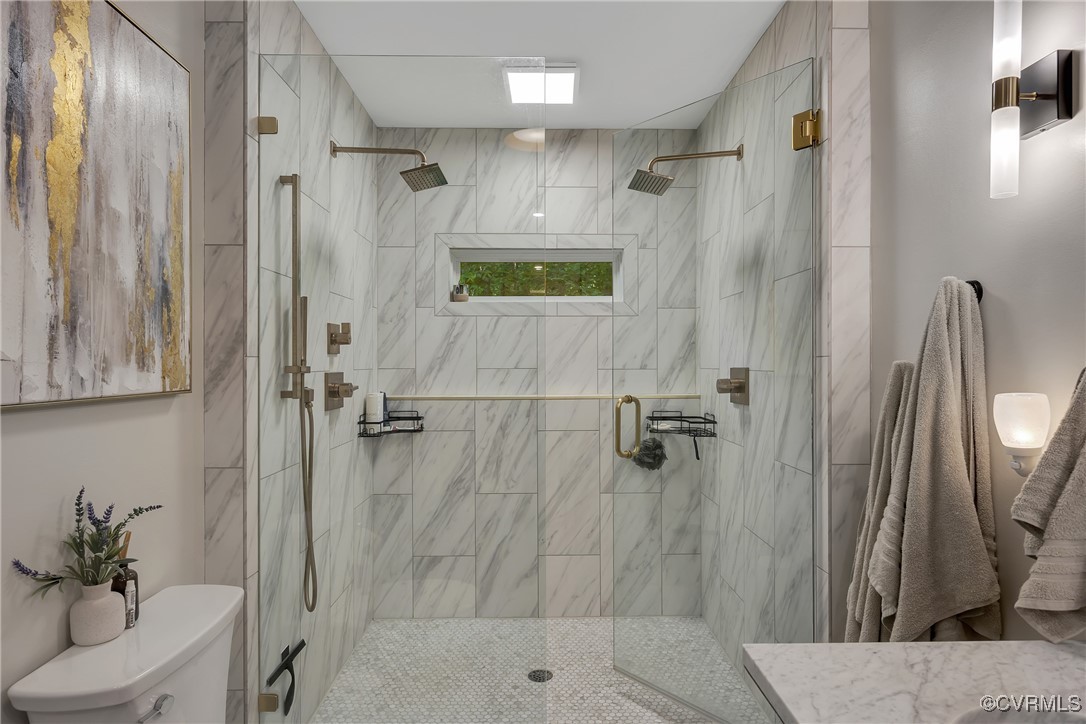 3924 Whitehall Road Sandy Hook, VA 23153 - Photo 26 of 50 a bathroom with a shower and a mirror