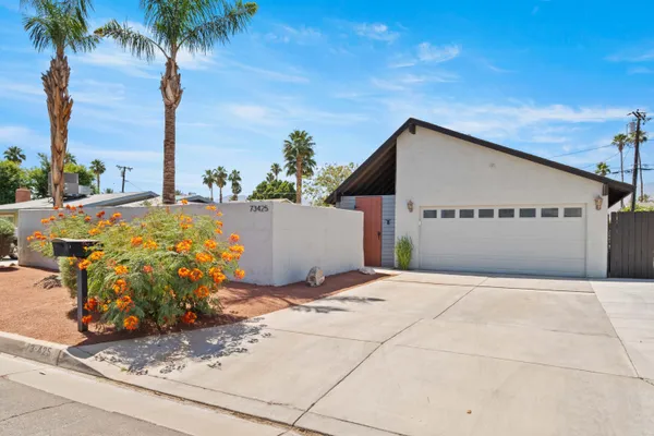 a view of a street with an outdoor space