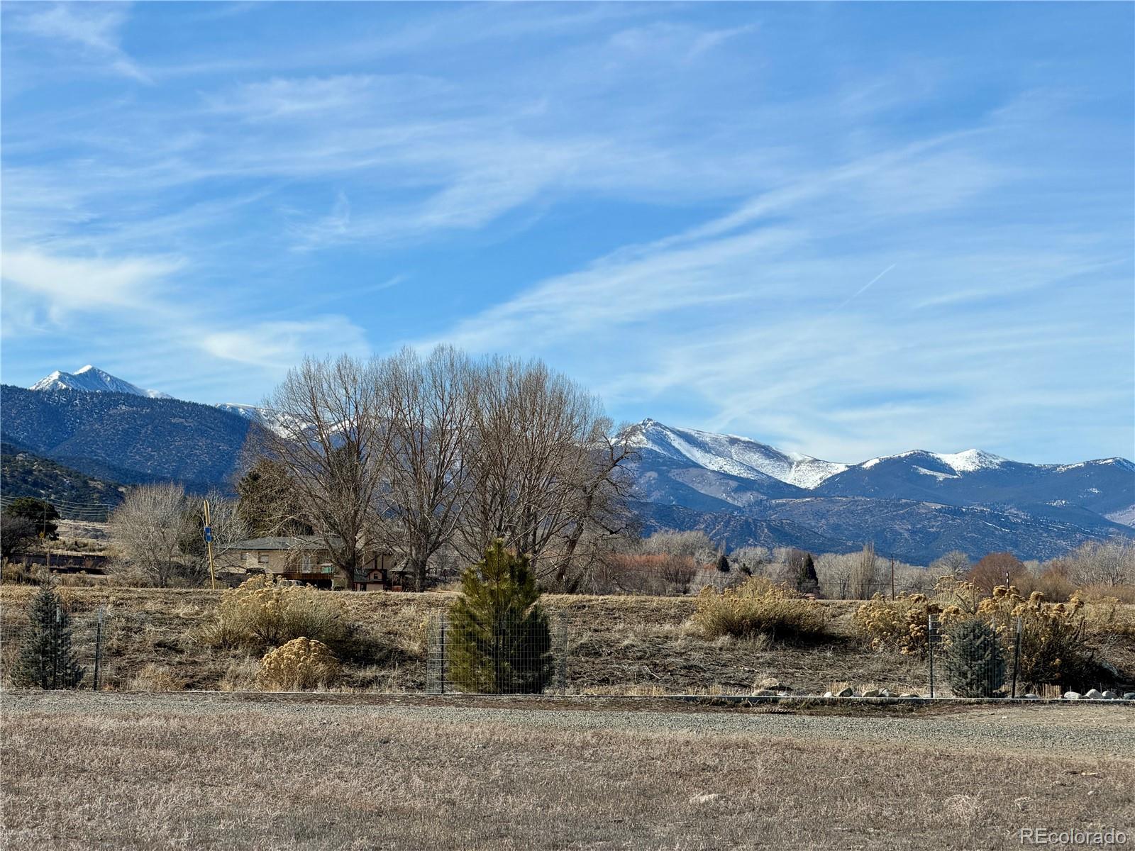 164 Southside Loop Salida, CO 81201 - Photo 3 of 12 a view of a backyard with large trees