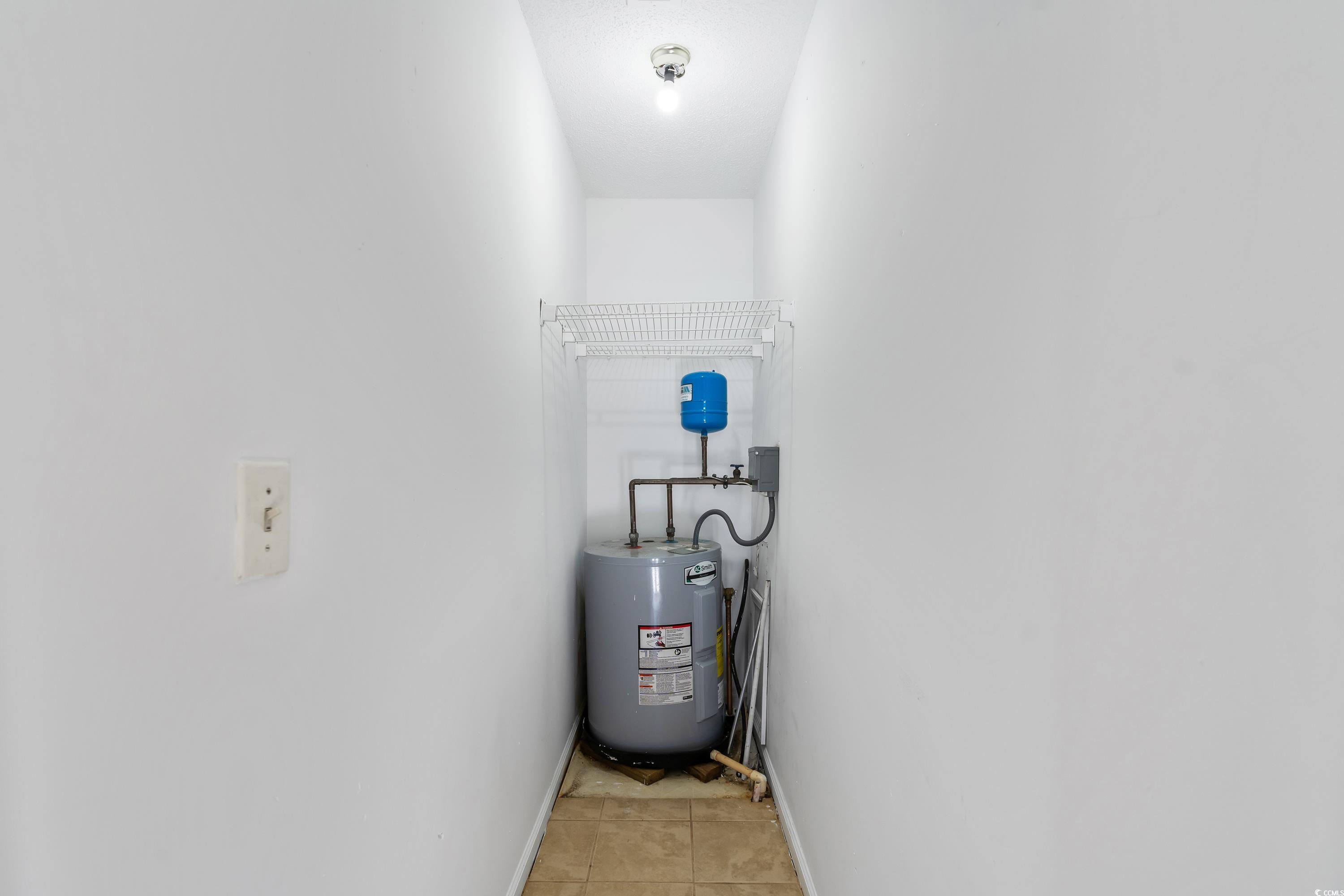 1024 Futrell Drive, Unit 1024 Myrtle Beach, SC 29577 - Photo 13 of 20 Utility room featuring water heater