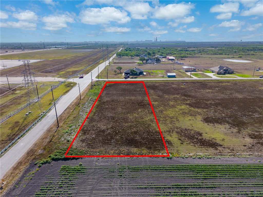 4325 Kestrel Portland, TX 78374 - Photo 6 of 8 a view of a lake with a big yard