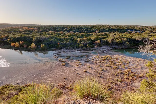 a view of mountain with lake view