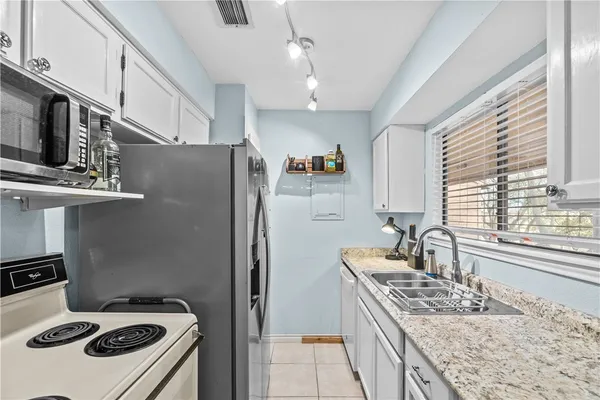 $112,000 | 7122 Premont Drive, Unit H202, Corpus Christi, TX 78414