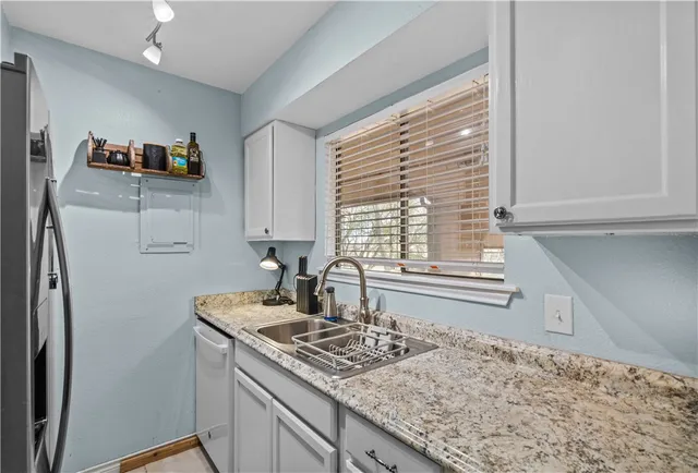 $118,000 | 7122 Premont Drive, Unit H202, Corpus Christi, TX 78414