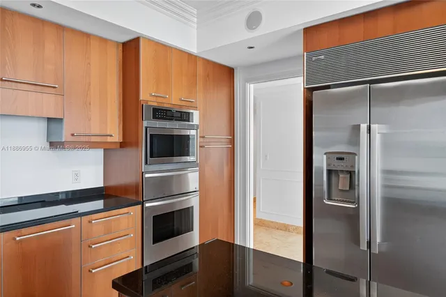 a view of a tables and chair in the balcony