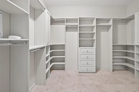 a view of room with walk in closet