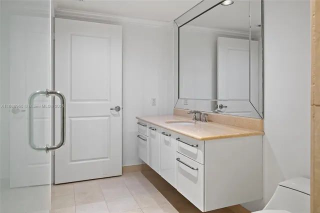 a lobby with furniture and a potted plant