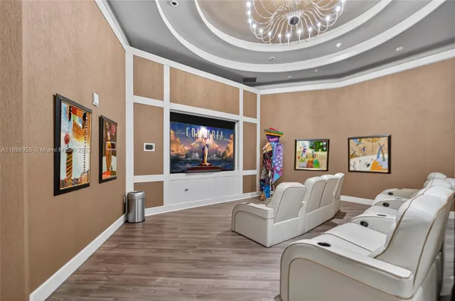 a view of a backyard with sitting area