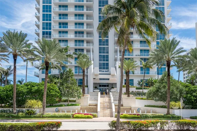 a view of a park with swings and slides