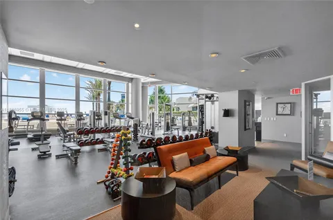 a swimming pool with outdoor seating