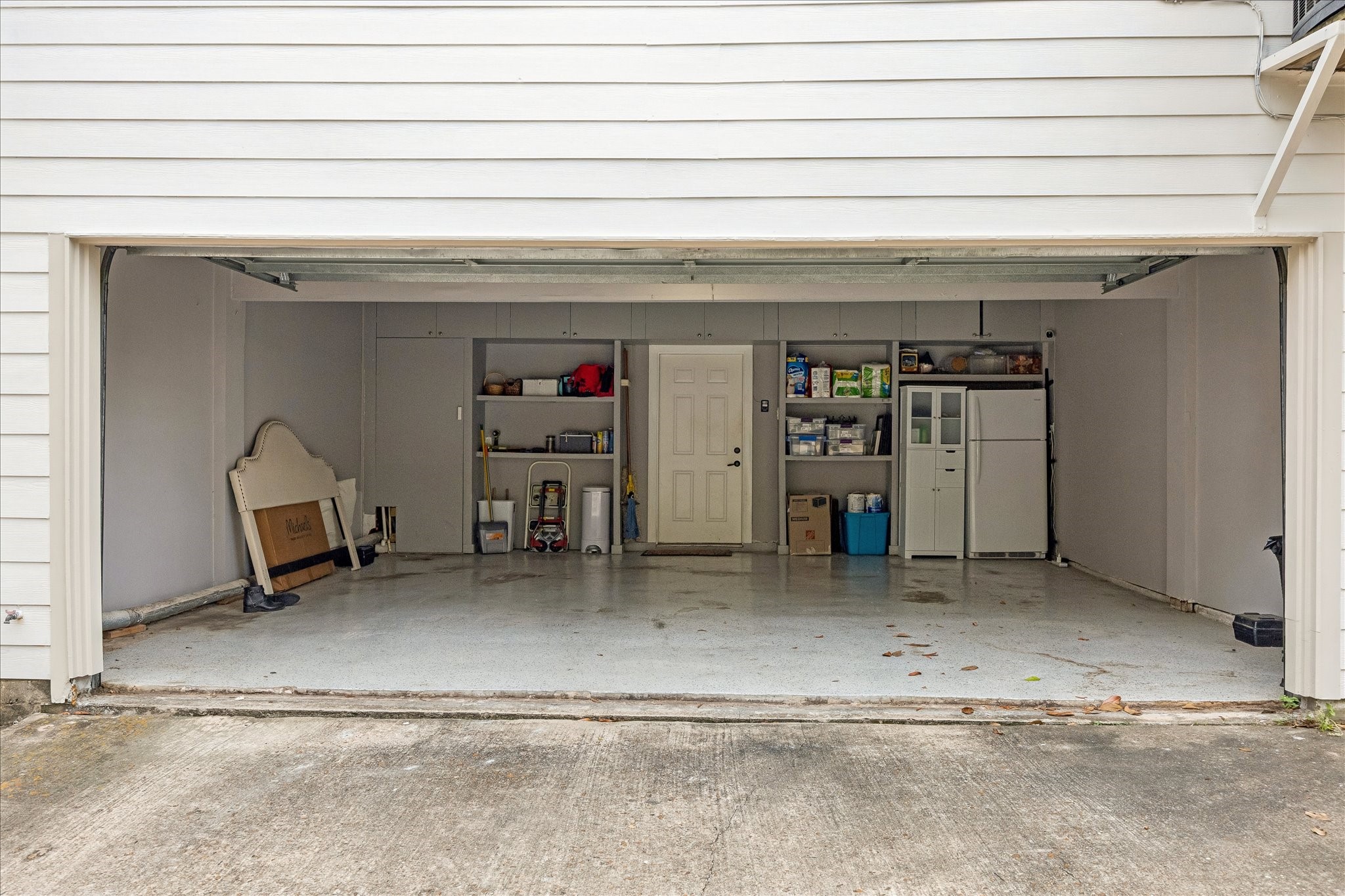 4520 Dickson Street Houston, TX 77007 - Photo 21 of 25 Oversized two car garage with epoxied floor and room for storage.