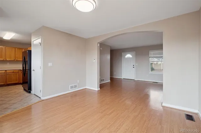 a view of a livingroom with wooden floor