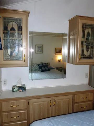 a kitchen with stainless steel appliances granite countertop a sink and cabinets