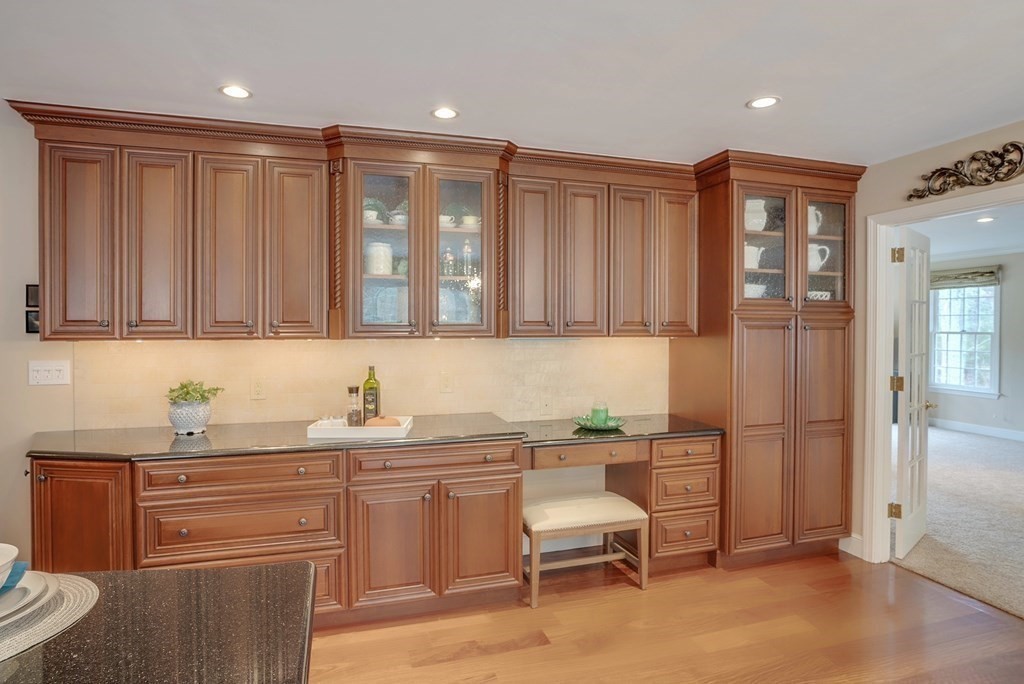 4 Paddock Lane Andover, MA 01810 - Photo 13 of 42 a kitchen with a sink and cabinets
