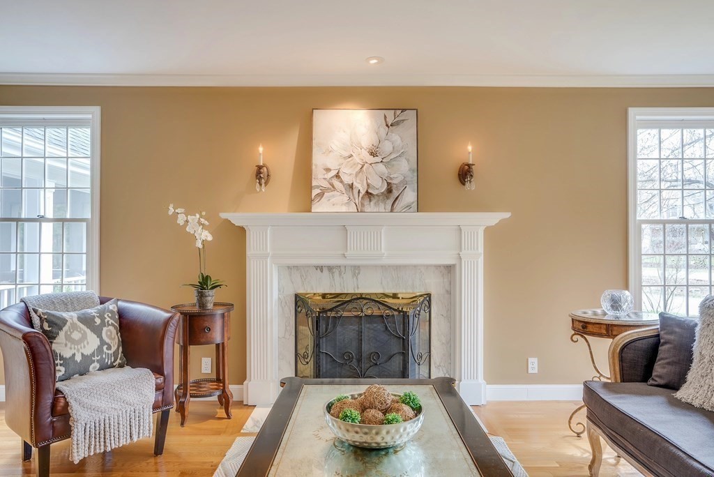 4 Paddock Lane Andover, MA 01810 - Photo 16 of 42 a living room with furniture and a fireplace