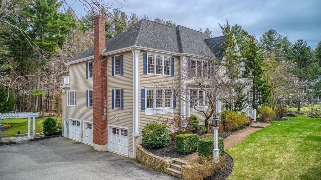 4 Paddock Lane Andover, MA 01810 - Photo 2 of 42 a view of a house with a yard
