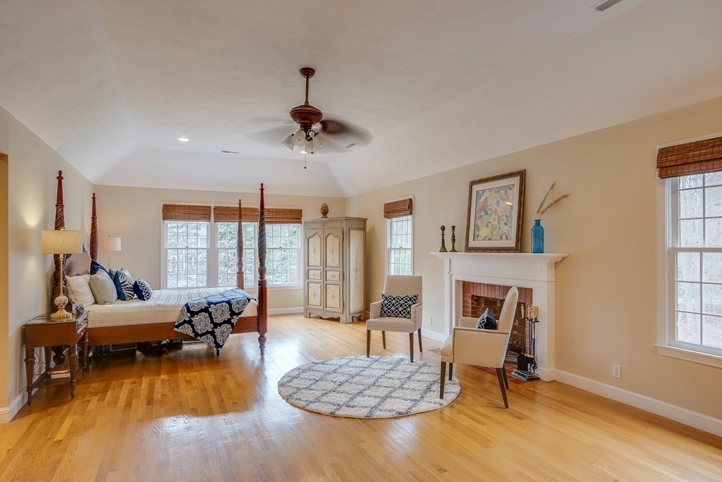 4 Paddock Lane Andover, MA 01810 - Photo 26 of 42 a living room with furniture fireplace and a large window