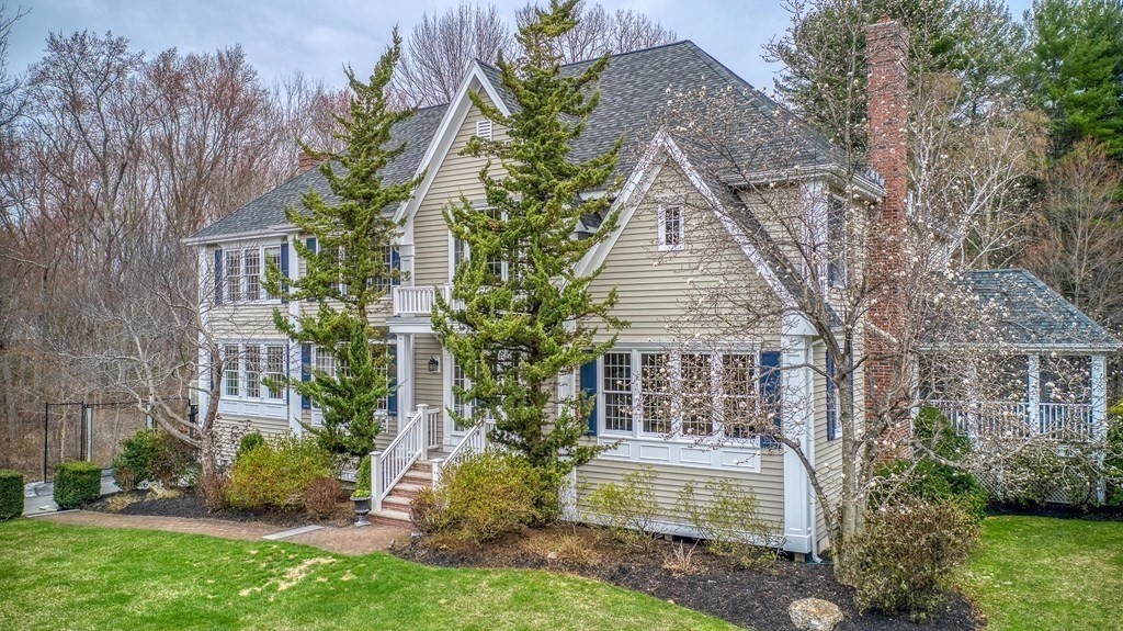 4 Paddock Lane Andover, MA 01810 - Photo 3 of 42 front view of house with a yard and potted plants