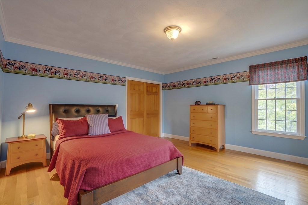 4 Paddock Lane Andover, MA 01810 - Photo 35 of 42 a bedroom with a bed and a window