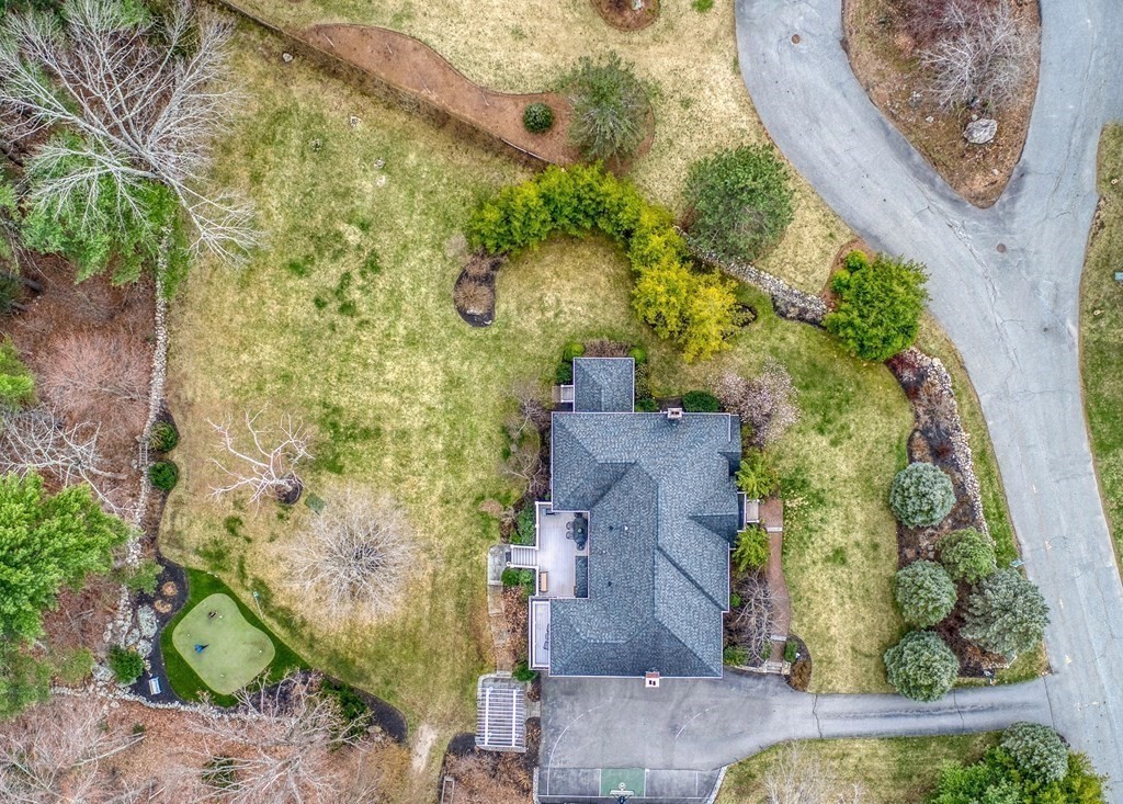 4 Paddock Lane Andover, MA 01810 - Photo 39 of 42 an aerial view of a house with a yard