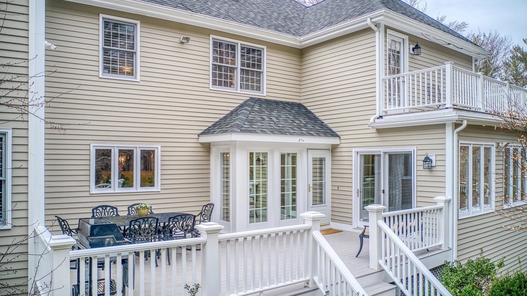 4 Paddock Lane Andover, MA 01810 - Photo 5 of 42 a view of a house with a wooden fence