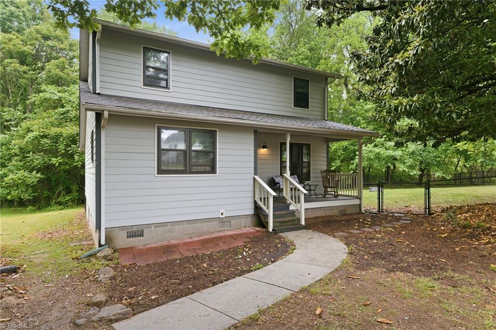 3546 Lewiston Road Greensboro, NC 27410 - Photo 27 of 32 Front of the home with covered porch