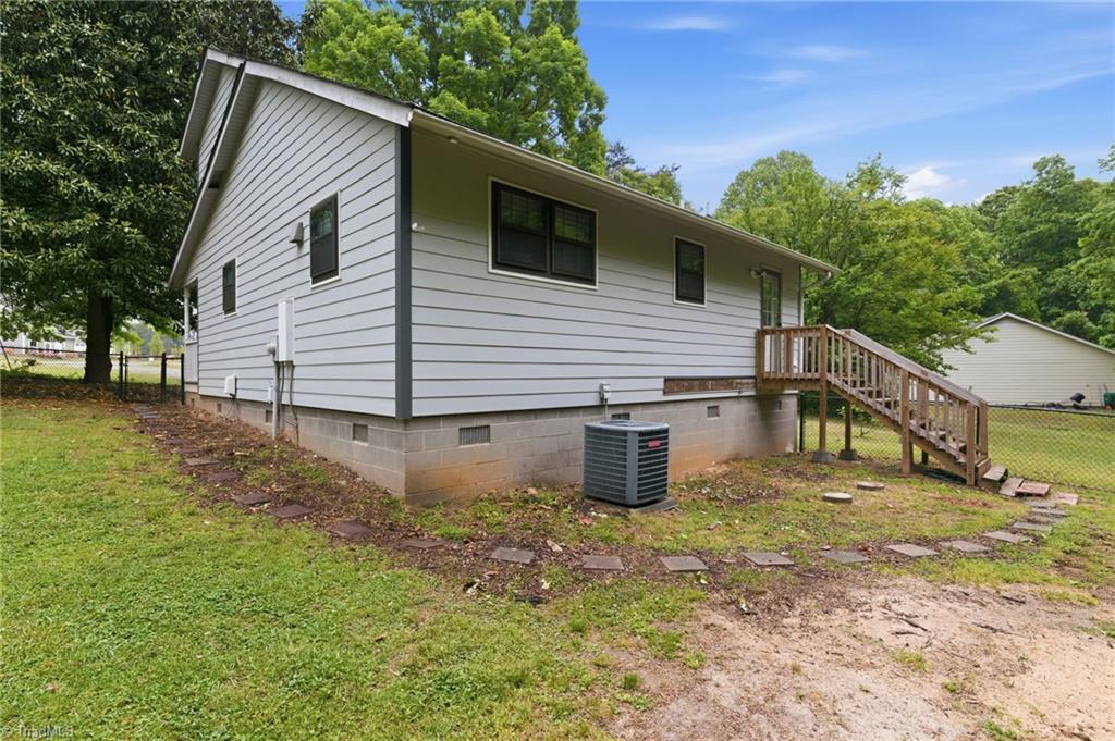 3546 Lewiston Road Greensboro, NC 27410 - Photo 28 of 32 Back of the home with access to laundry room