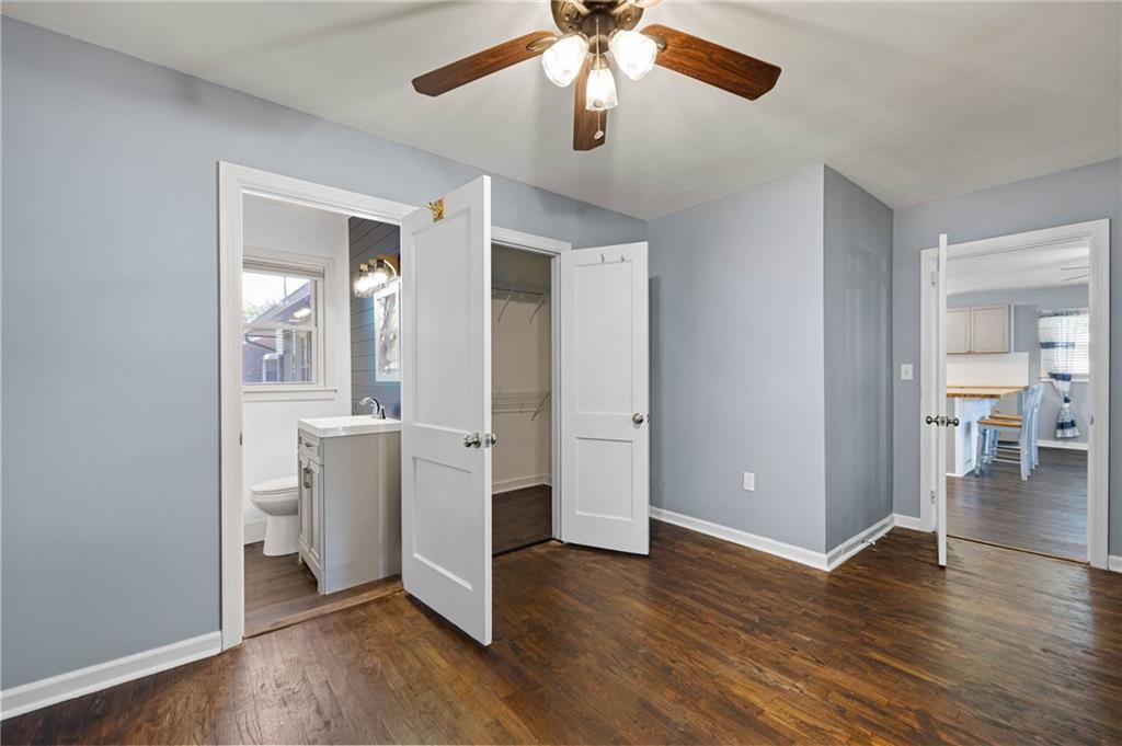3871 Furr Avenue Powder Springs, GA 30127 - Photo 19 of 32 wooden floor in an empty room with a window