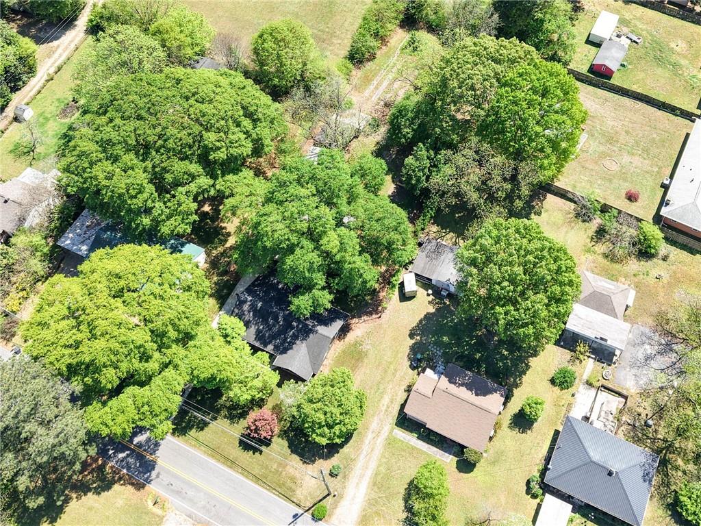 3871 Furr Avenue Powder Springs, GA 30127 - Photo 30 of 32 an aerial view of a house with a yard and outdoor seating