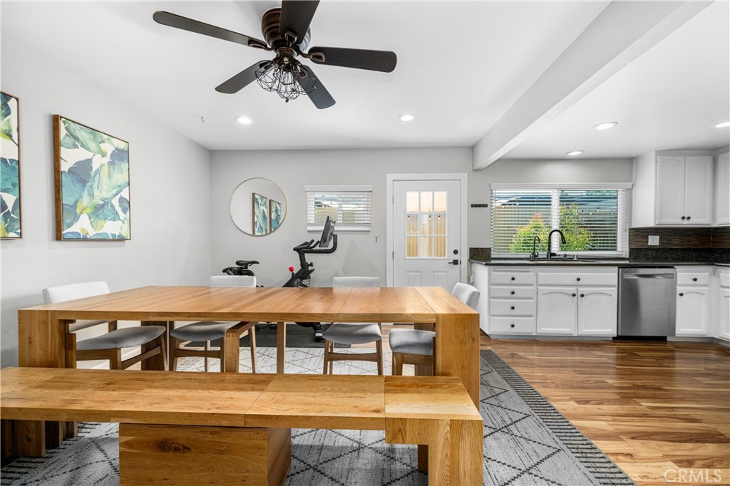 4237 Larwin Avenue Cypress, CA 90630 - Photo 12 of 48 a large kitchen with stainless steel appliances granite countertop a stove and a sink