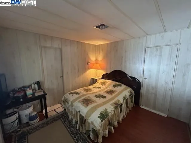 a bathroom with a double vanity sink and mirror