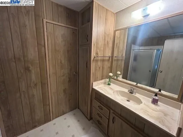 a bathroom with a shower and toilet