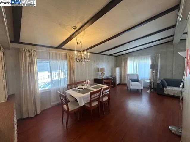 a livingroom with furniture and window