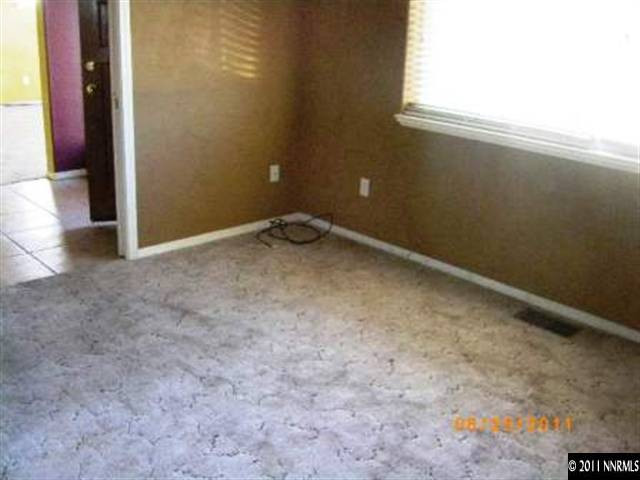 2489 Cartwright Road Reno, NV 89521 - Photo 7 of 10 an empty room with windows