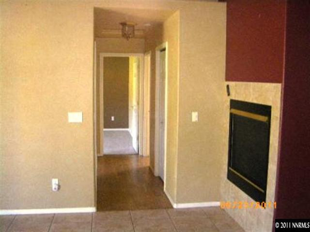 2489 Cartwright Road Reno, NV 89521 - Photo 8 of 10 a view of a bathroom with a glass door and a shower