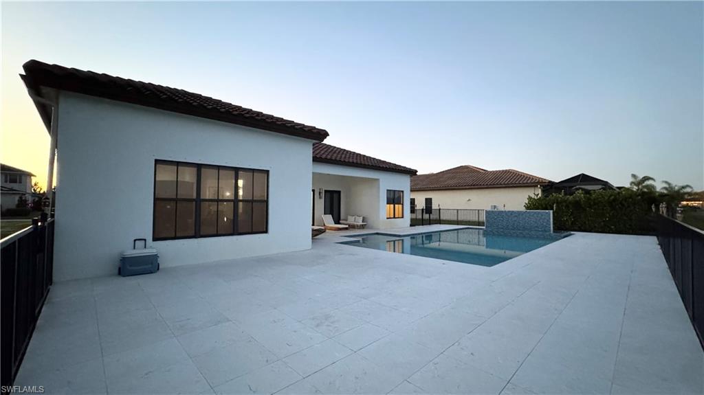 5340 Allen Place Ave Maria, FL 34142 - Photo 18 of 35 View of swimming pool with a patio area and a fenced backyard