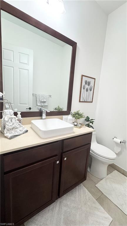 5340 Allen Place Ave Maria, FL 34142 - Photo 6 of 35 Bathroom featuring vanity and light tile patterned floors