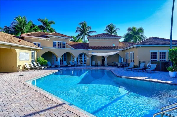 a view of a house with swimming pool