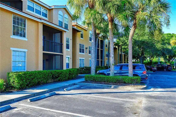 a kitchen with a stove and a refrigerator