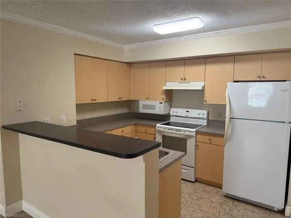 a utility room with washer and dryer