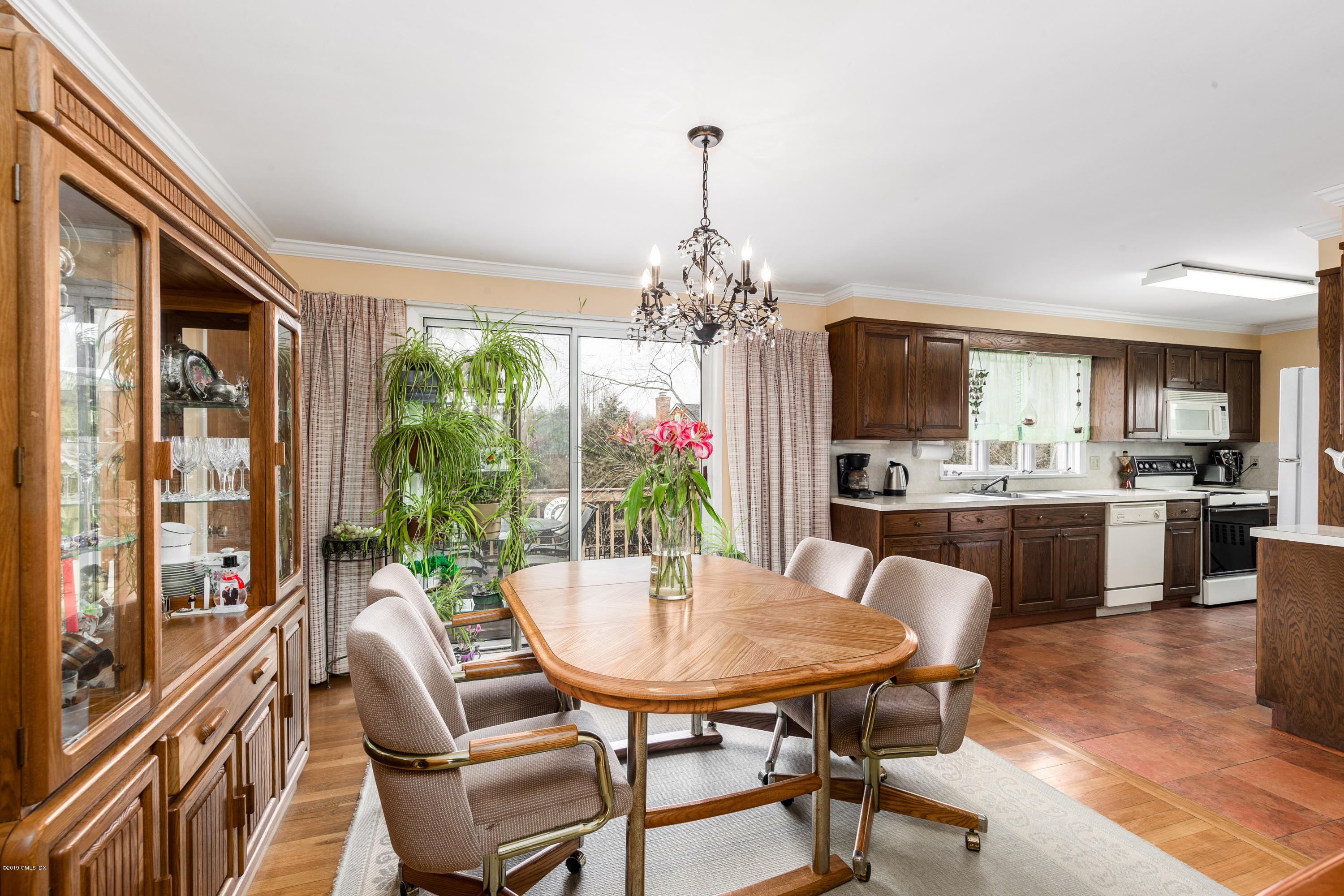 19 Sunshine Avenue Riverside, CT 06878 - Photo 4 of 14 a view of a dining room with furniture window and wooden floor